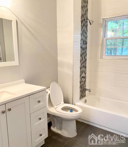 10 Idlewild Road Edison, NJ 08817 - Photo 12 of 21 a bathroom with a toilet a sink and a bathtub