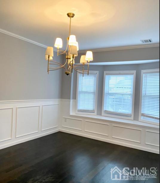 10 Idlewild Road Edison, NJ 08817 - Photo 20 of 21 a view of a room with wooden floor and staircase
