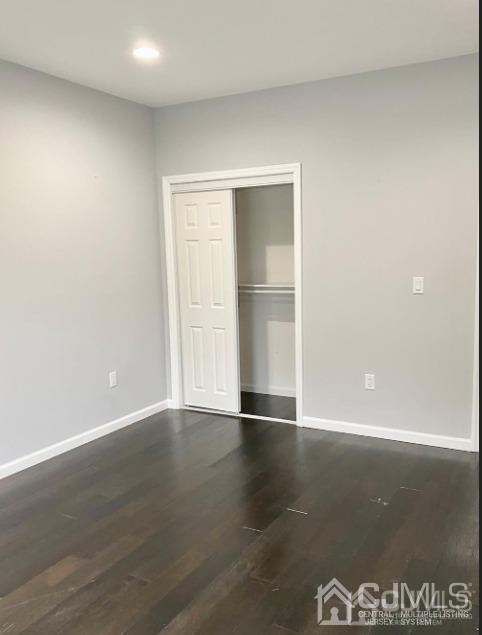 10 Idlewild Road Edison, NJ 08817 - Photo 9 of 21 a view of an empty room with wooden floor