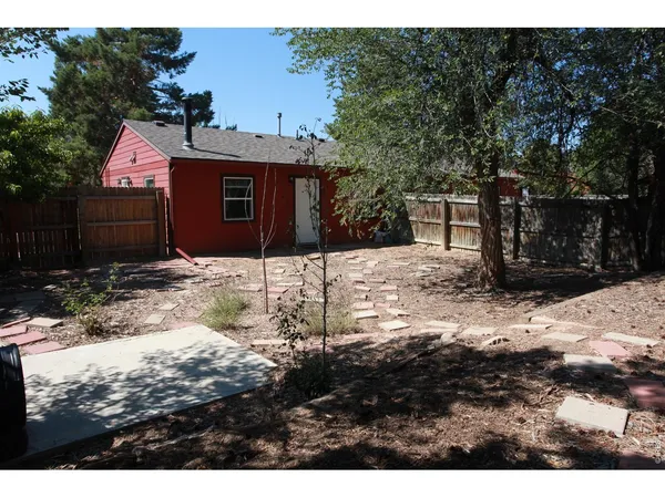 a view of a backyard of a house