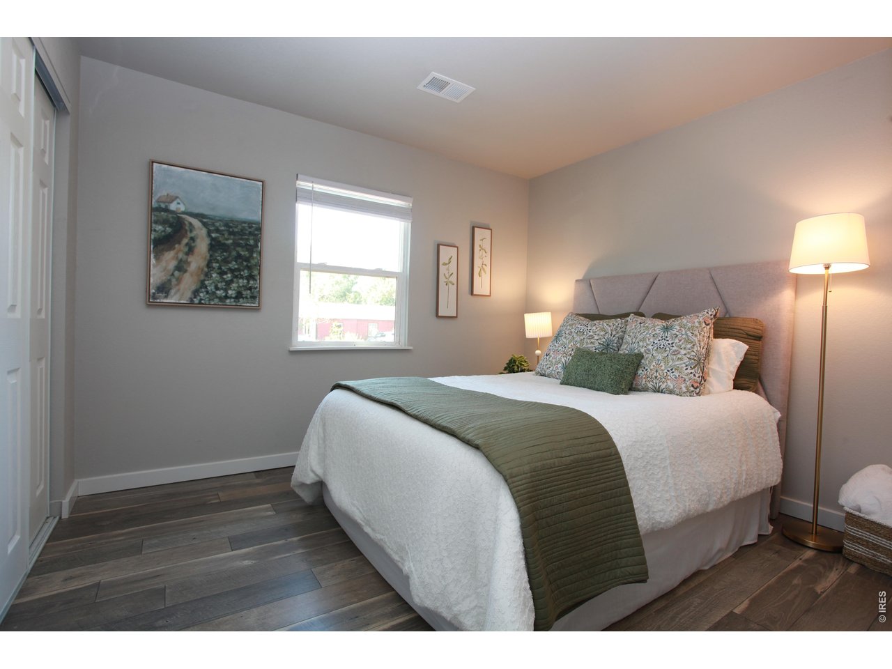 2908 West Olive Street Fort Collins, CO 80521 - Photo 7 of 20 a bedroom with a bed and a window