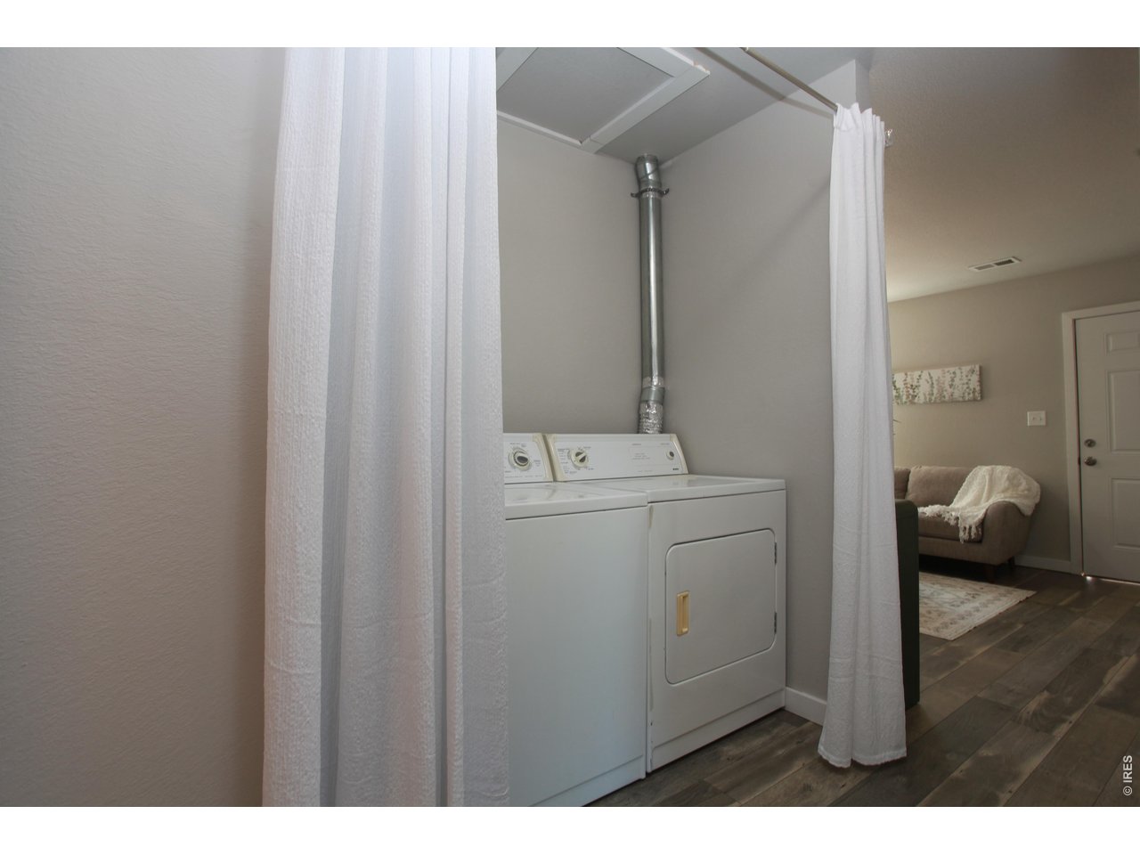 2908 West Olive Street Fort Collins, CO 80521 - Photo 10 of 20 a en suite bathroom with a sink and mirror