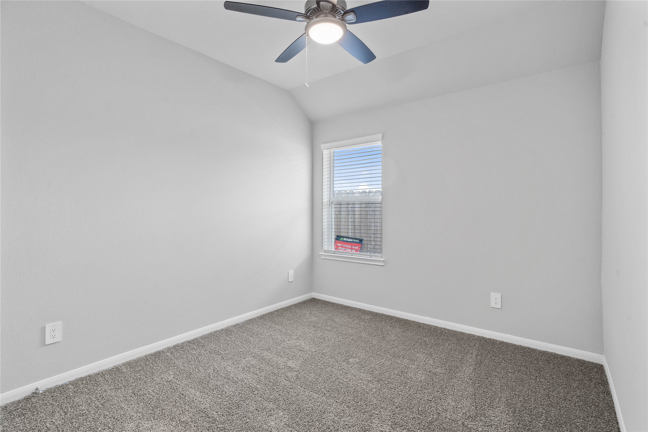 19555 Montgomery Rdg Way Montgomery, TX 77316 - Photo 10 of 38 This cozy secondary bedroom offers plush soft carpeting, neutral walls ready for personalization, a sun-filled window with fitted blinds, sloped ceilings, and a spacious closet for all your storage needs.
