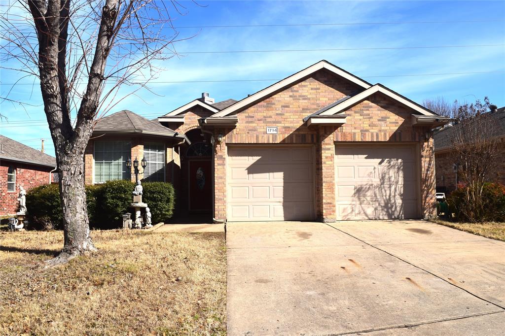 1714 Rustic Lane Garland, TX 75040 - Photo 1 of 20 a view of a house with a snow on the wall