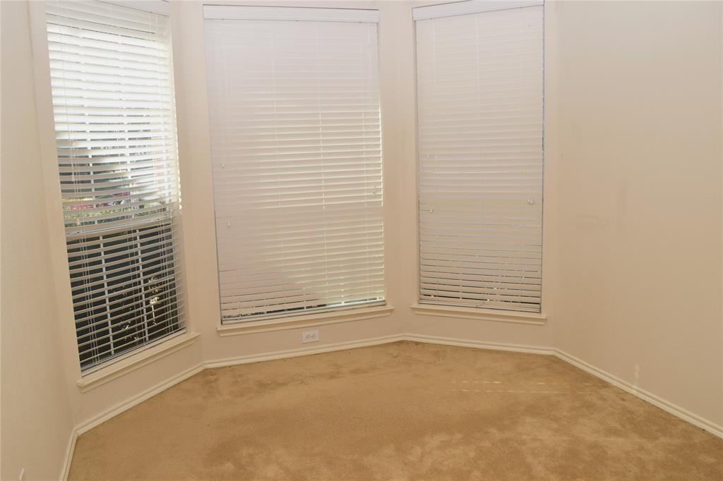 1714 Rustic Lane Garland, TX 75040 - Photo 11 of 20 a view of an empty room with a window