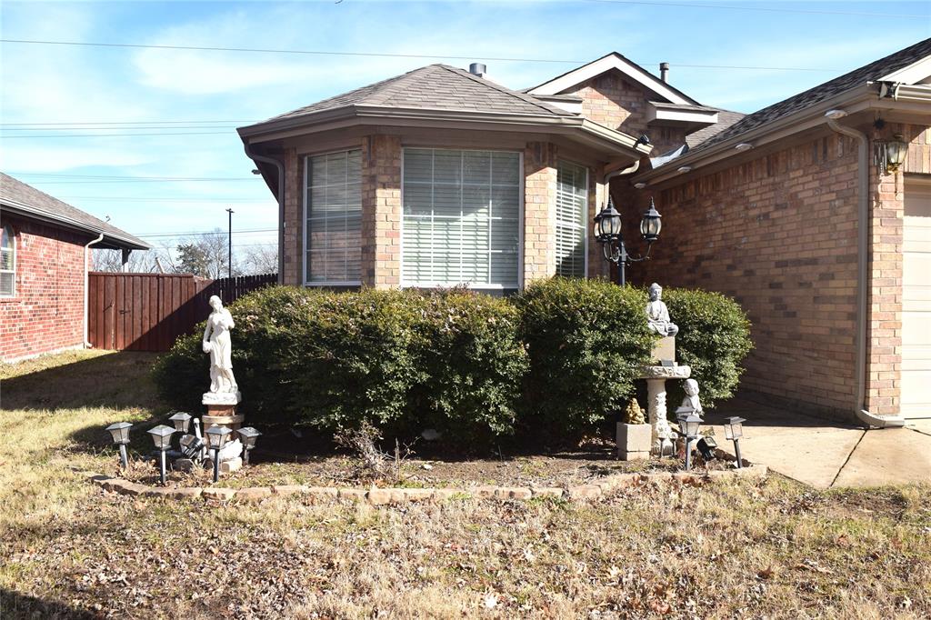 1714 Rustic Lane Garland, TX 75040 - Photo 12 of 20 a front view of a house