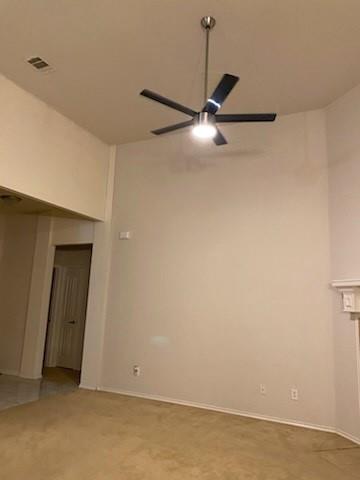 1714 Rustic Lane Garland, TX 75040 - Photo 14 of 20 a view of an empty room with a ceiling fan