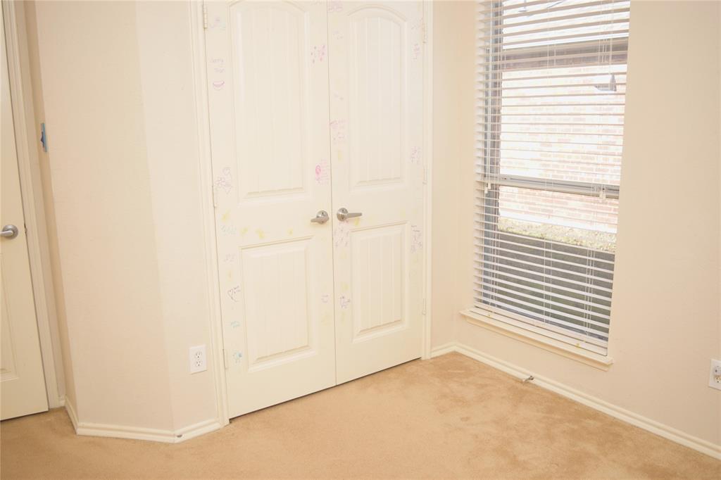 1714 Rustic Lane Garland, TX 75040 - Photo 6 of 20 a view of a room that has a window in it