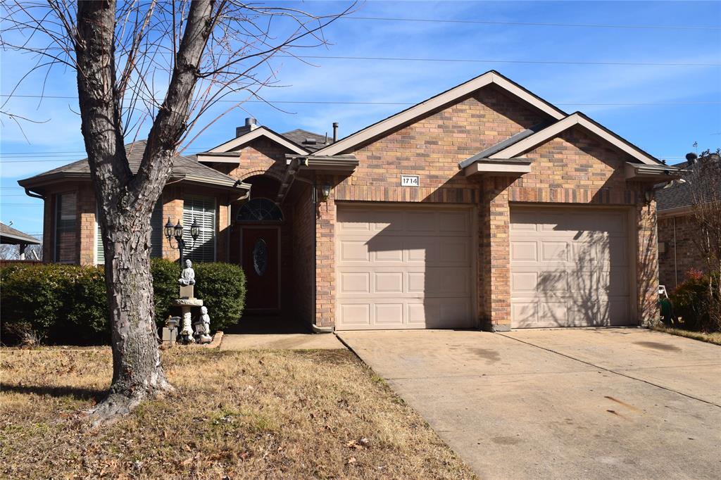 1714 Rustic Lane Garland, TX 75040 - Photo 10 of 20 a front view of a house with a yard