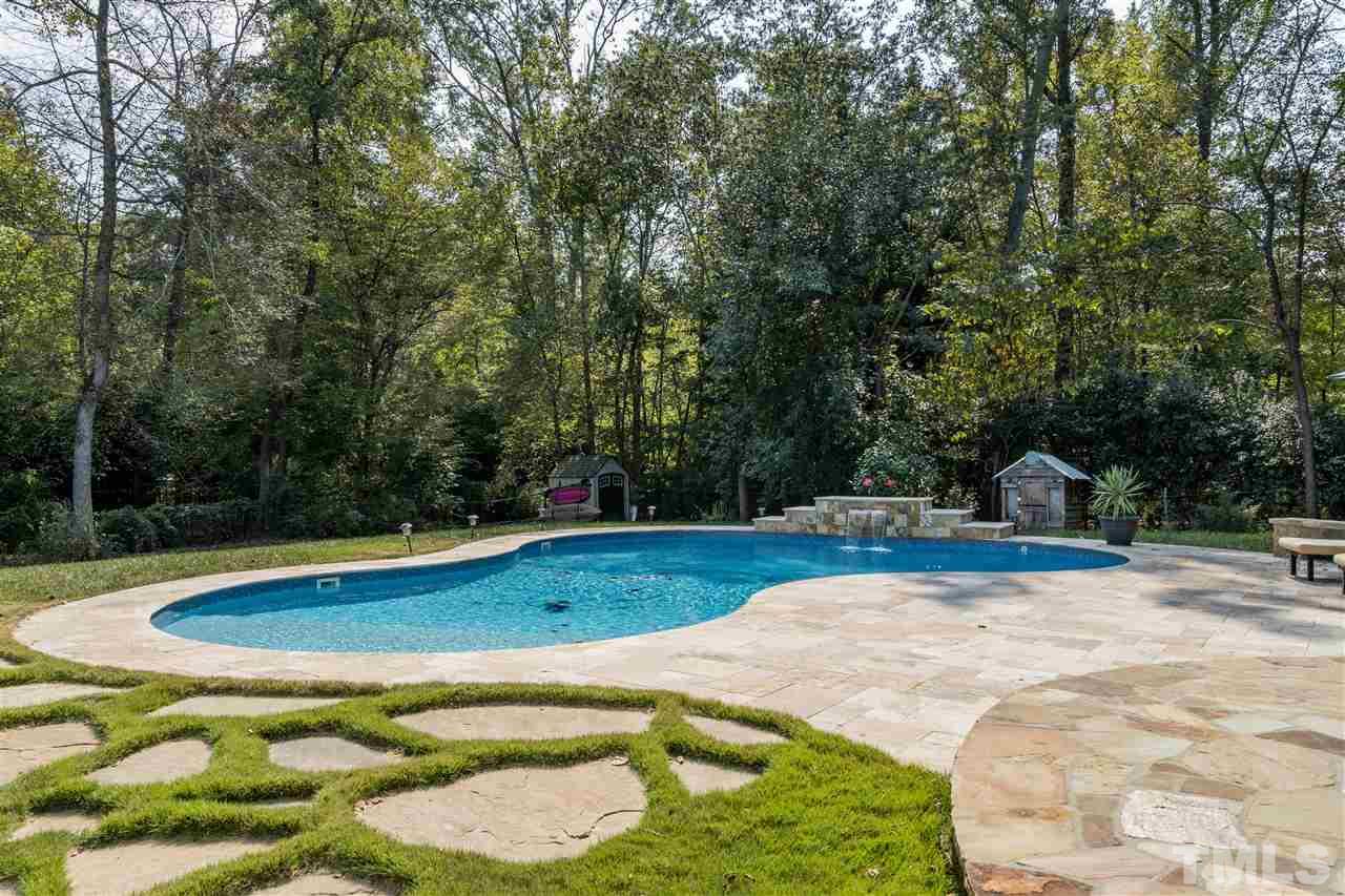 800 Hardimont Road Raleigh, NC 27609 - Photo 22 of 26 a view of a swimming pool with a patio