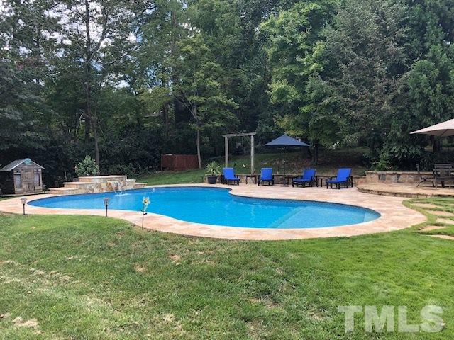 800 Hardimont Road Raleigh, NC 27609 - Photo 24 of 26 a view of outdoor space with swimming pool and patio