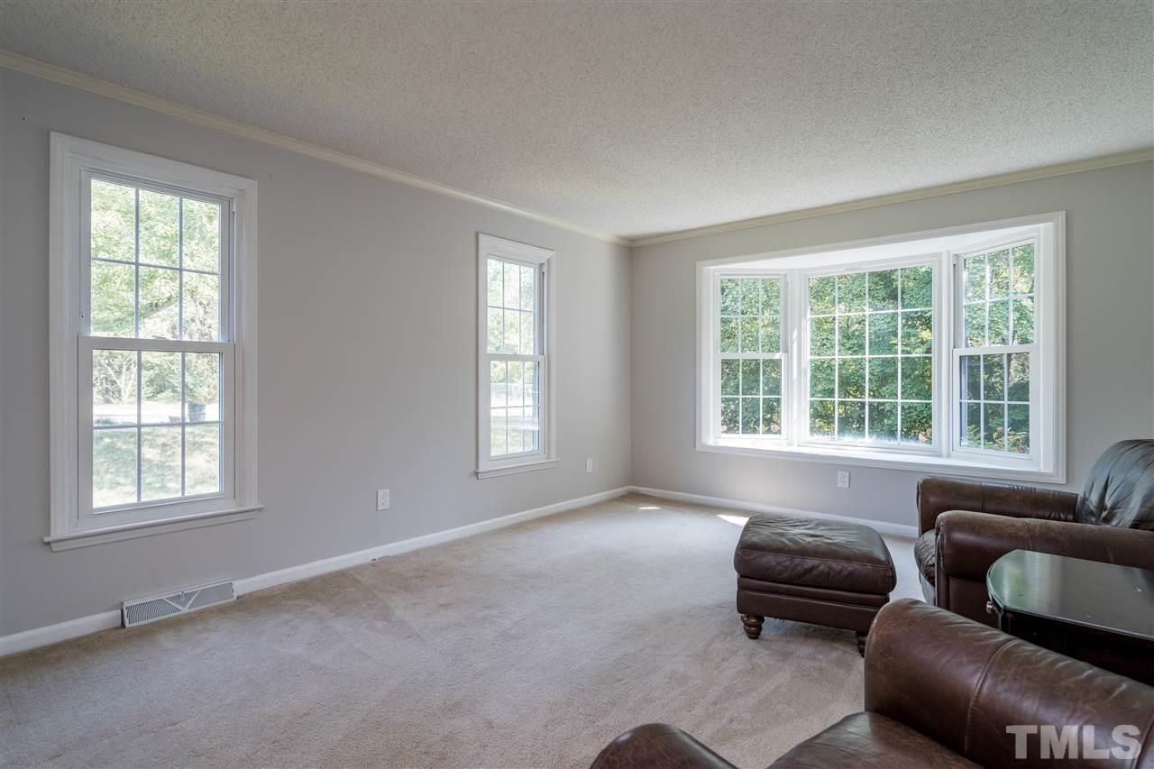800 Hardimont Road Raleigh, NC 27609 - Photo 7 of 26 a living room with furniture and a window