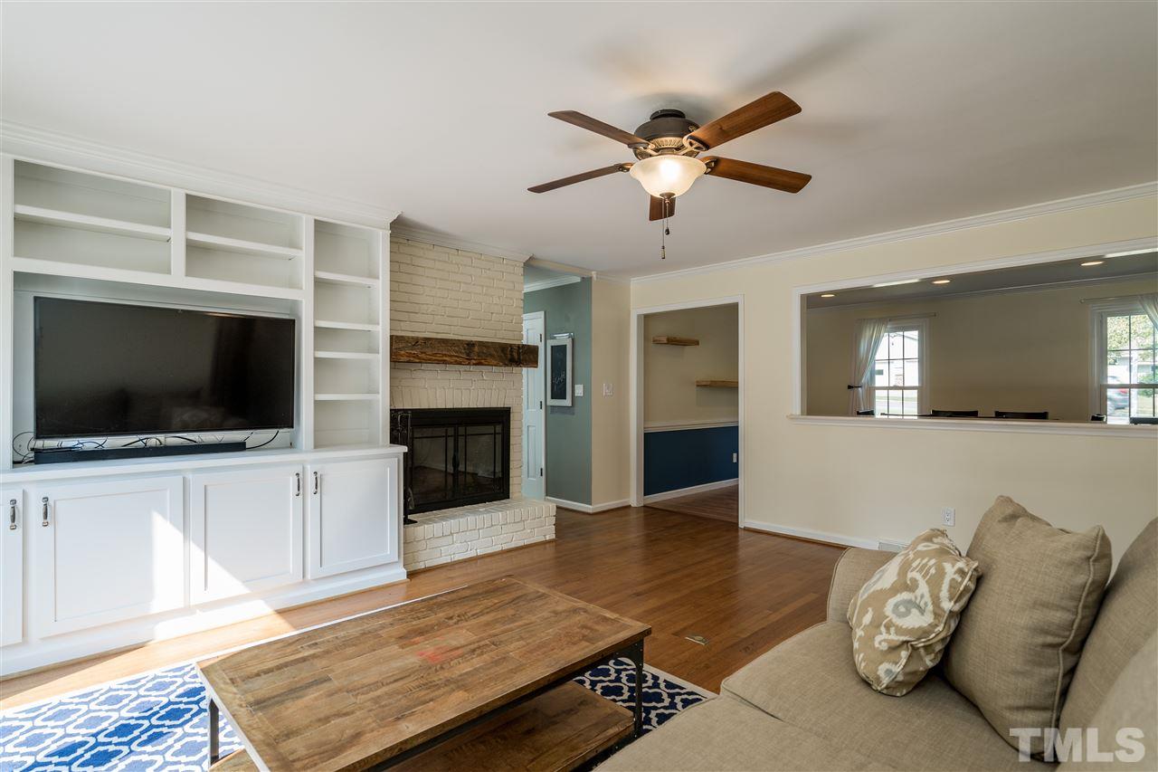 800 Hardimont Road Raleigh, NC 27609 - Photo 10 of 26 a living room with furniture and a flat screen tv