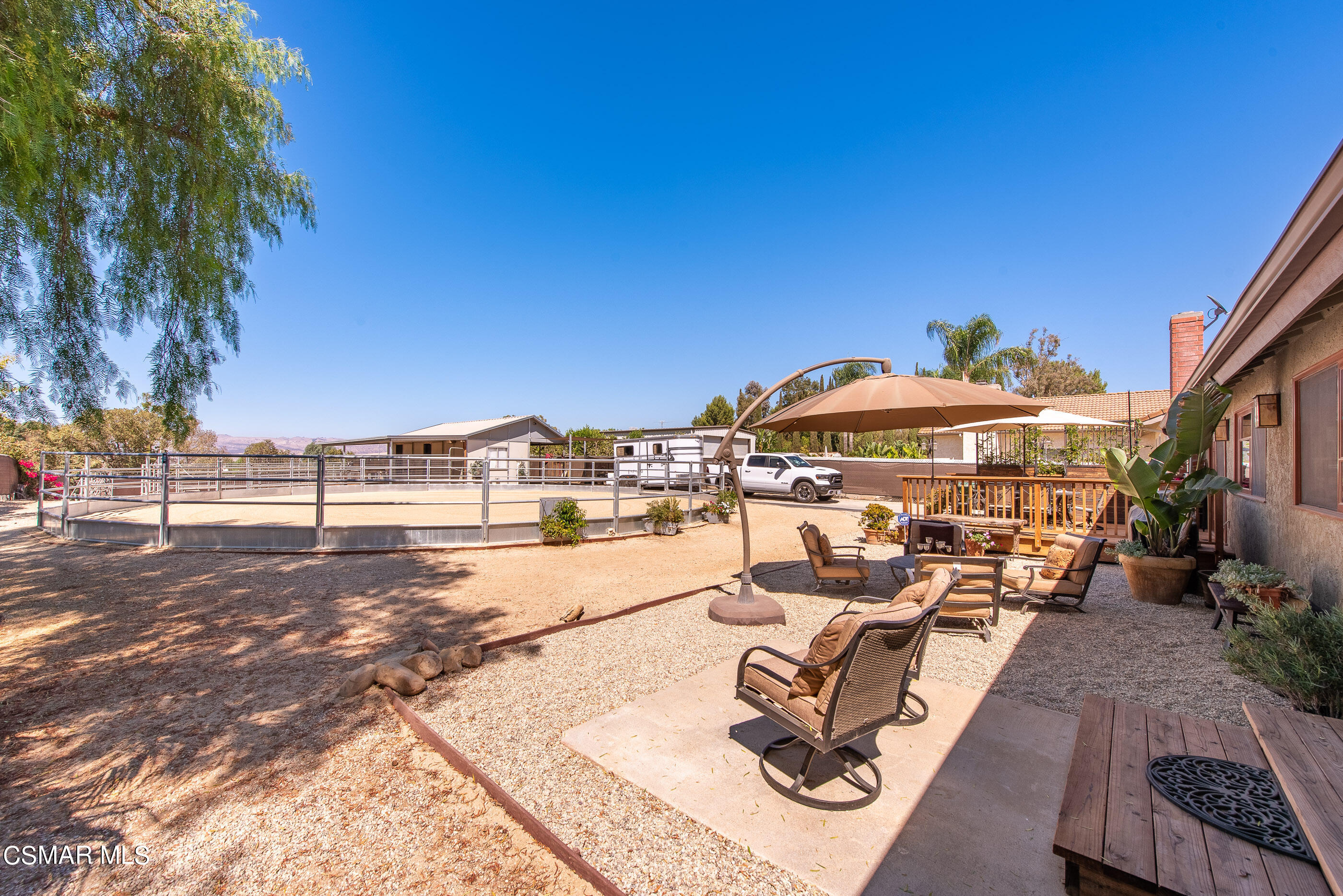1543 Rambling Road Simi Valley, CA 93065 - Photo 50 of 89 a view of a terrace with wooden floor and city view