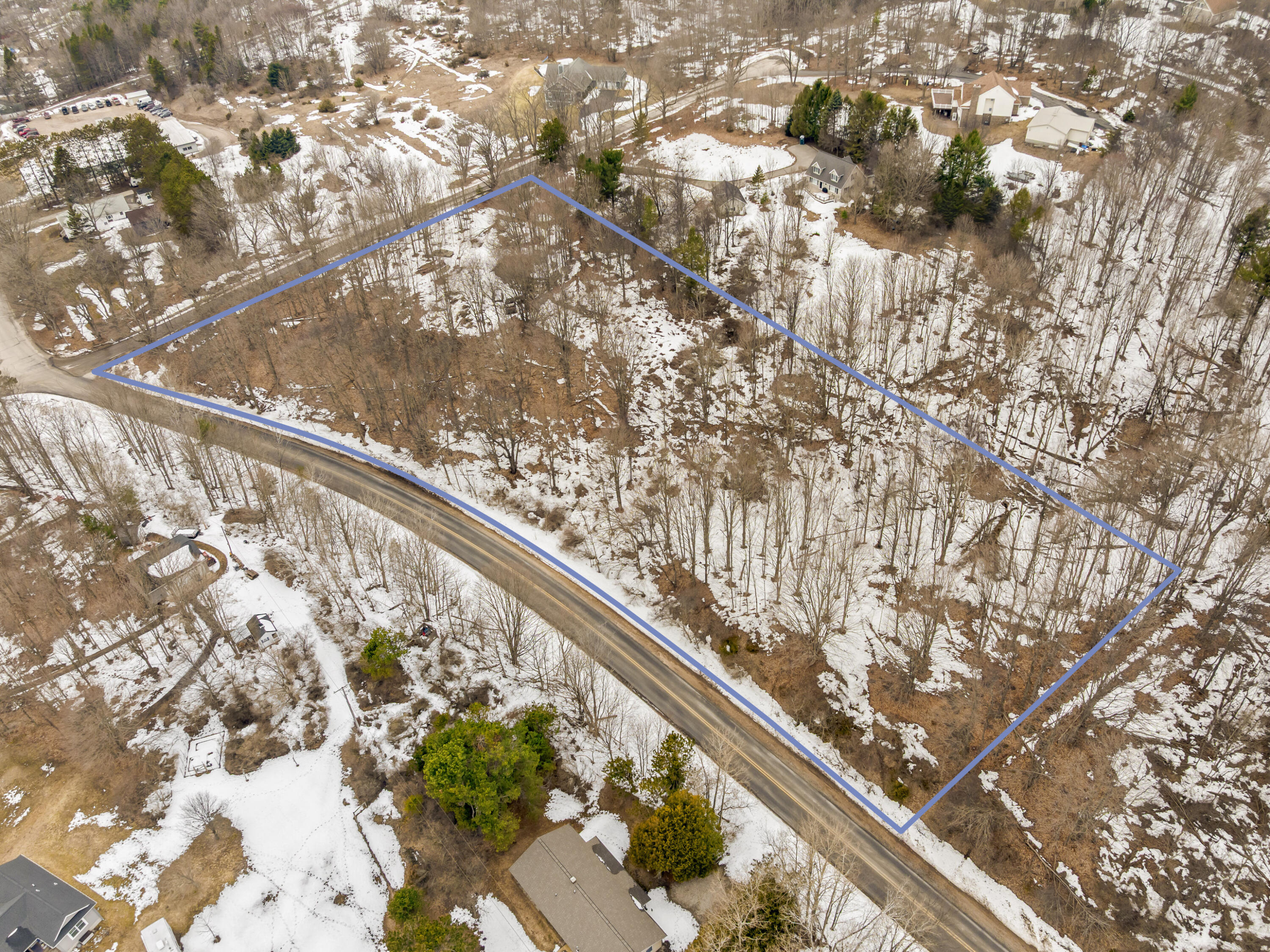 Elm Street Frankfort, MI 49635 - Photo 4 of 12 DJI_20260305123238_0030_D