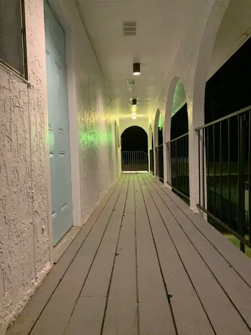 a view of gallery with balcony