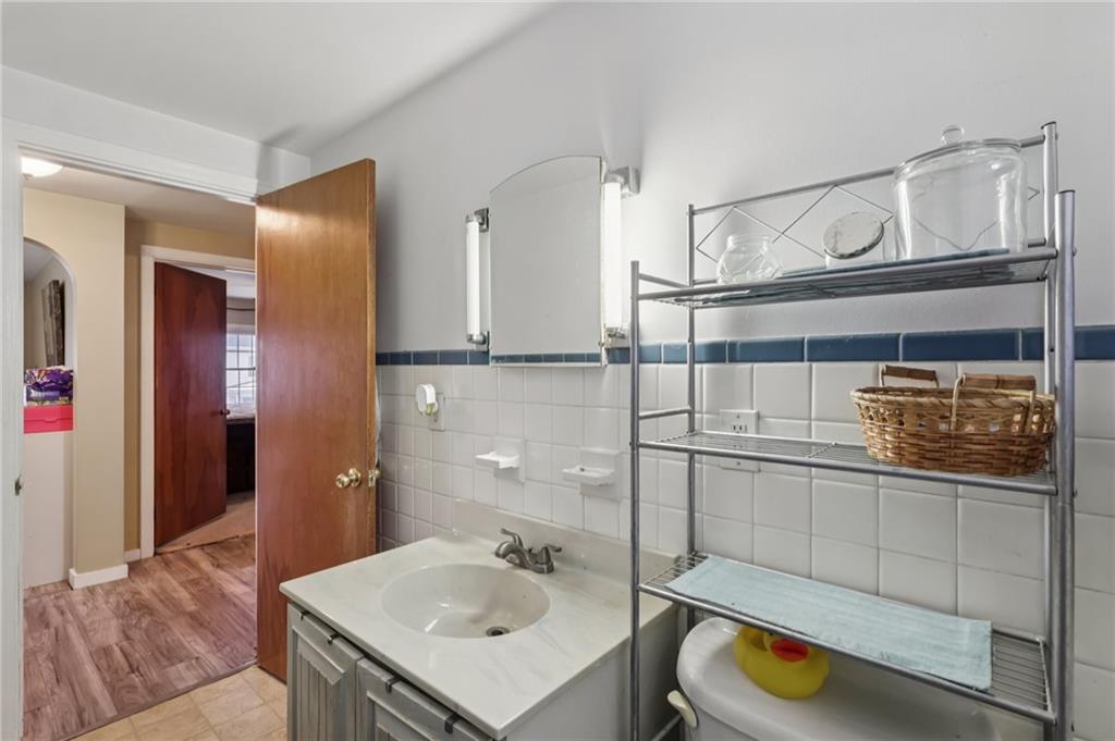 101 East Patterson Avenue Butler, PA 16001 - Photo 20 of 25 a bathroom with a sink and a mirror