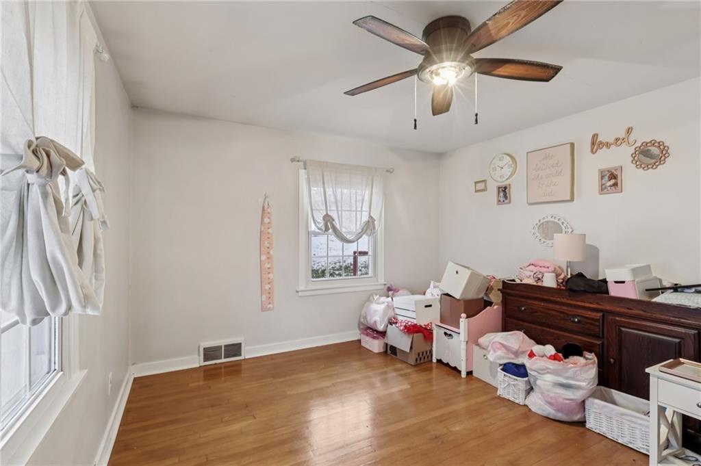 101 East Patterson Avenue Butler, PA 16001 - Photo 23 of 25 a bedroom with furniture and a chandelier fan