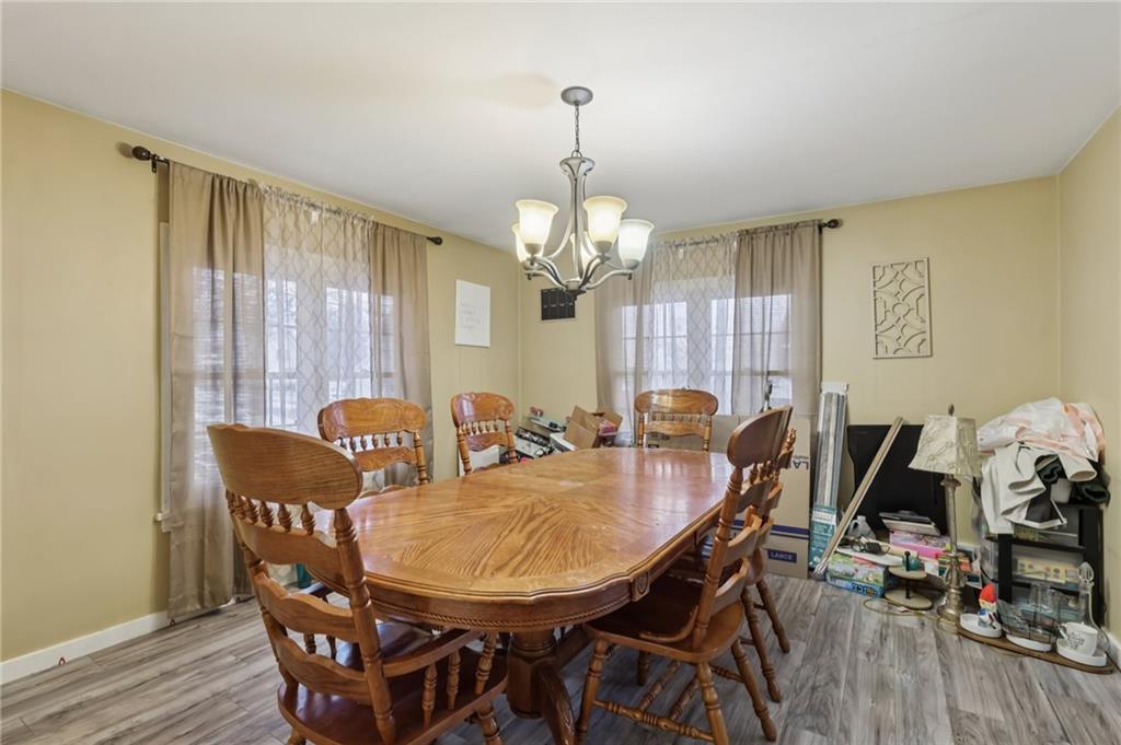101 East Patterson Avenue Butler, PA 16001 - Photo 9 of 25 a view of a dining room with furniture and wooden floor