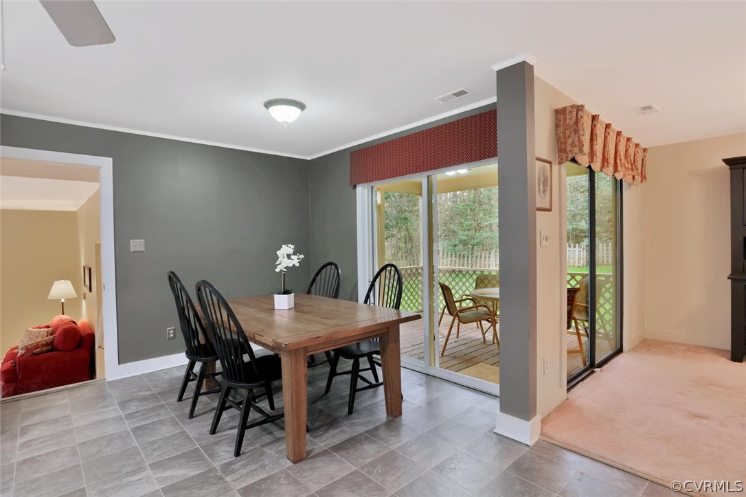 3907 Timber Ridge Place Midlothian, VA 23112 - Photo 18 of 32 a view of a dining room with furniture window and outside view