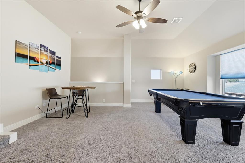 4609 Jasmine Trail Midlothian, TX 76065 - Photo 25 of 34 Game room featuring billiards table, light carpet, a ceiling fan, and vaulted ceiling
