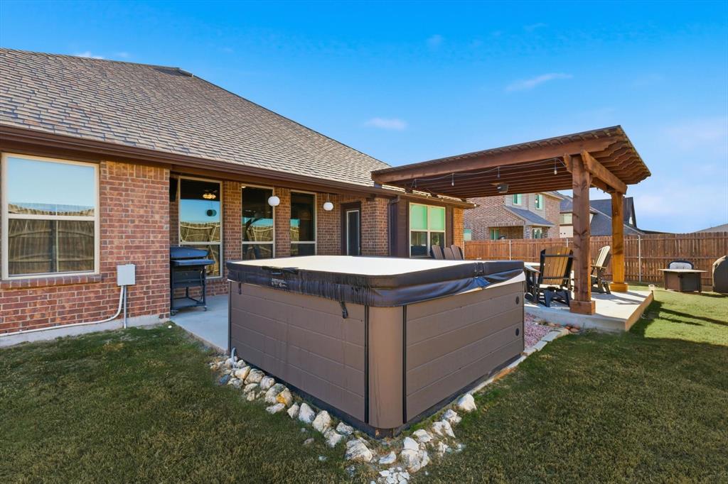 4609 Jasmine Trail Midlothian, TX 76065 - Photo 30 of 34 View of patio featuring a hot tub and heating fuel