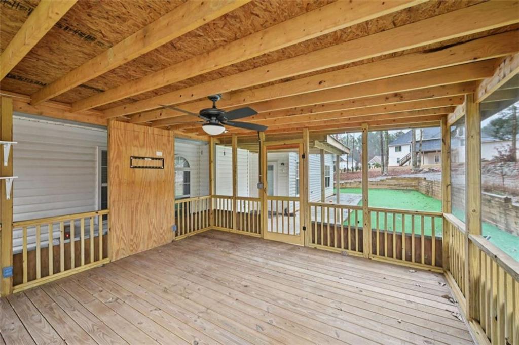 25 Castlehill Court Covington, GA 30016 - Photo 27 of 32 a view of a wooden deck