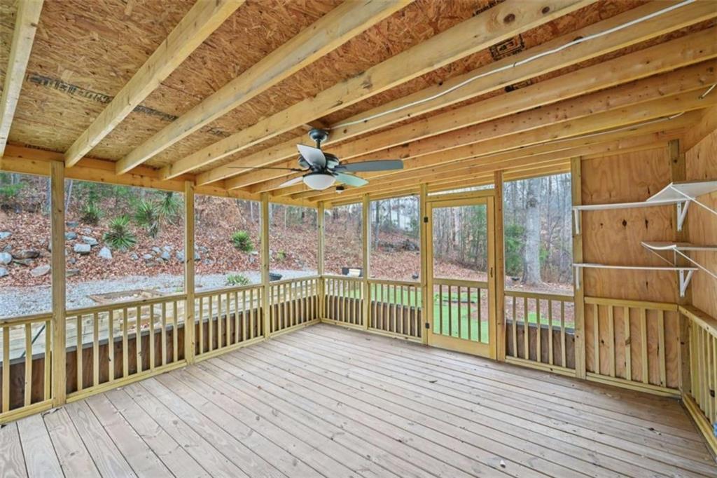 25 Castlehill Court Covington, GA 30016 - Photo 28 of 32 a view of a balcony with wooden floor