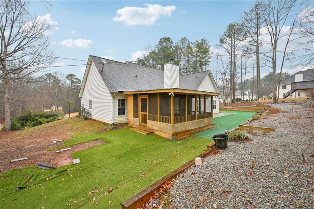 25 Castlehill Court Covington, GA 30016 - Photo 29 of 32 a view of a house with a yard