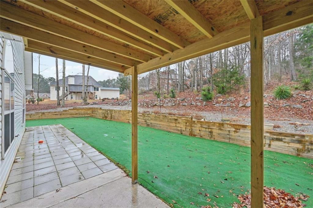 25 Castlehill Court Covington, GA 30016 - Photo 30 of 32 a view of a porch with a backyard