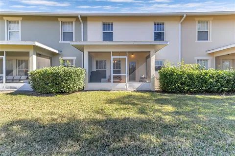 a front view of a house having garden