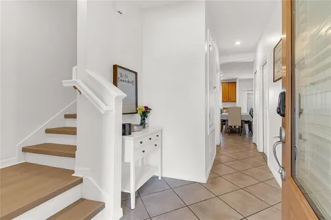 a view of a hallway view with staircase