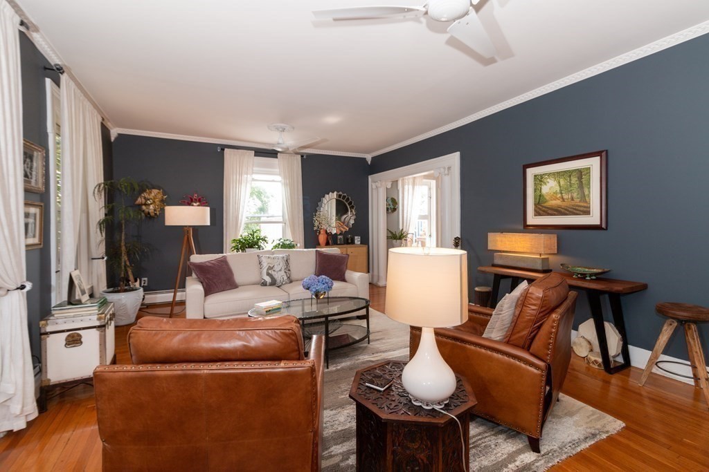 70 Cherry Street, Unit 1 Lynn, MA 01902 - Photo 13 of 40 a living room with furniture and wooden floor