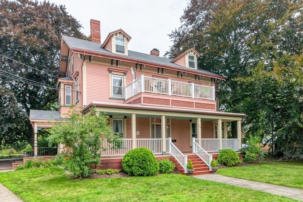70 Cherry Street, Unit 1 Lynn, MA 01902 - Photo 39 of 40 a front view of a house with garden and porch