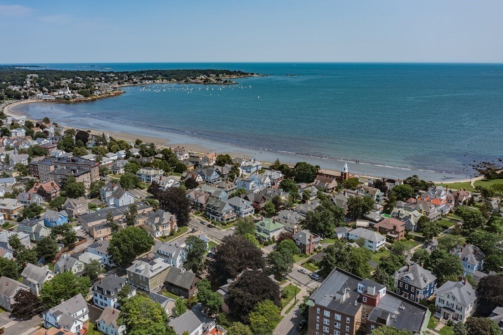 70 Cherry Street, Unit 1 Lynn, MA 01902 - Photo 40 of 40 an aerial view of a houses with a lake view