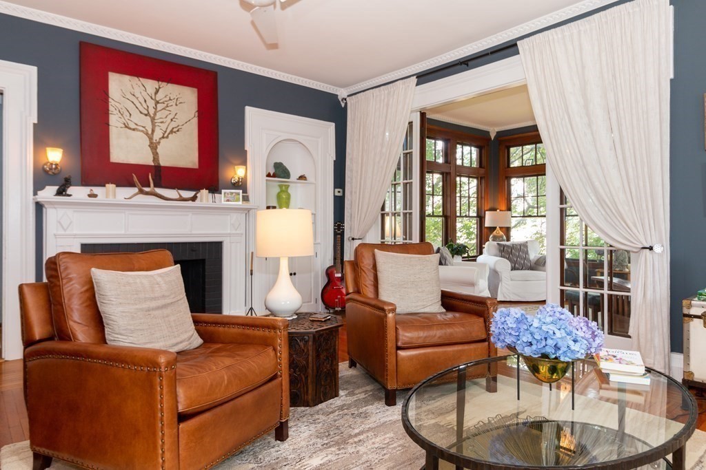 70 Cherry Street, Unit 1 Lynn, MA 01902 - Photo 4 of 40 a living room with furniture a fireplace and a large window