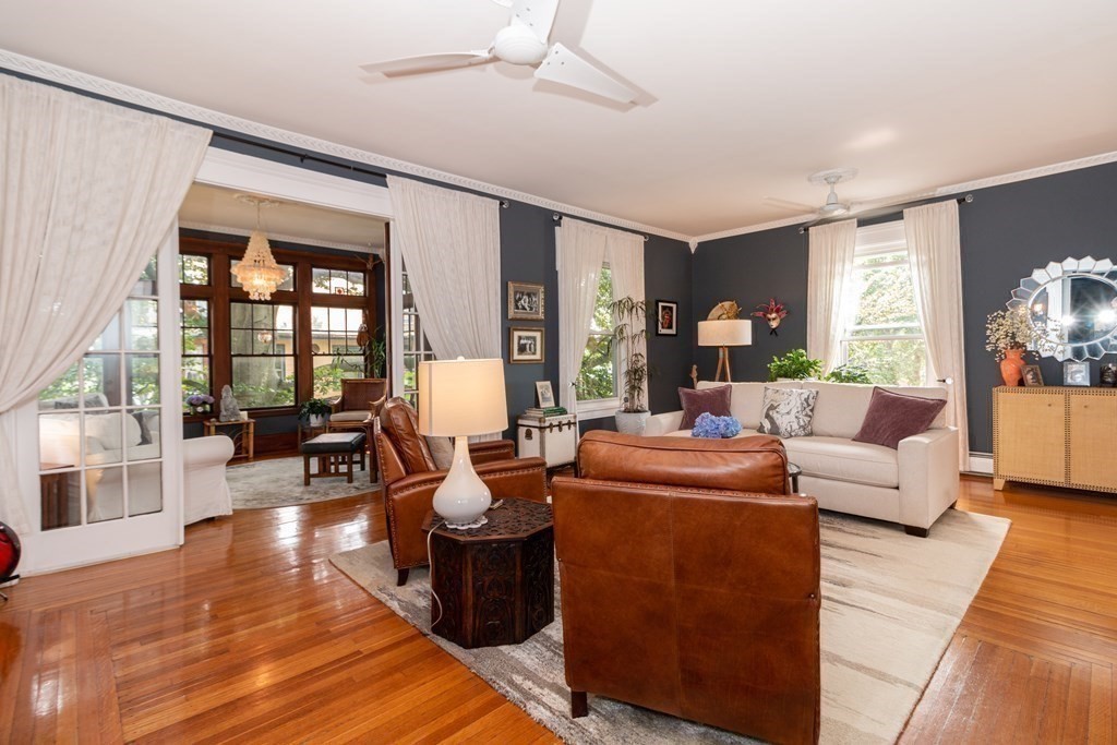 70 Cherry Street, Unit 1 Lynn, MA 01902 - Photo 8 of 40 a living room with fireplace furniture and a large window
