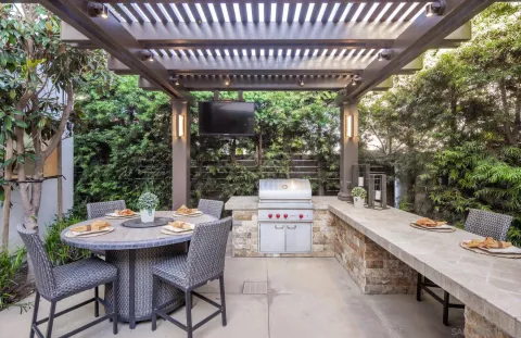 a outdoor dining space with furniture and outdoor view