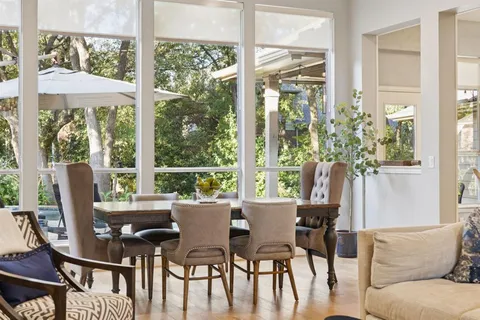 a kitchen that has a lot of cabinets in it