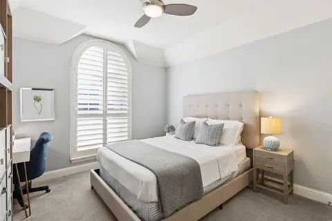 a bathroom with double sink and a mirror