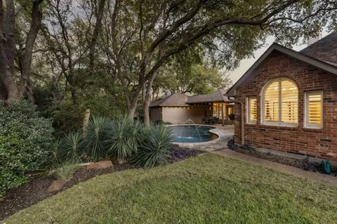 a view of a swimming pool with an outdoor space