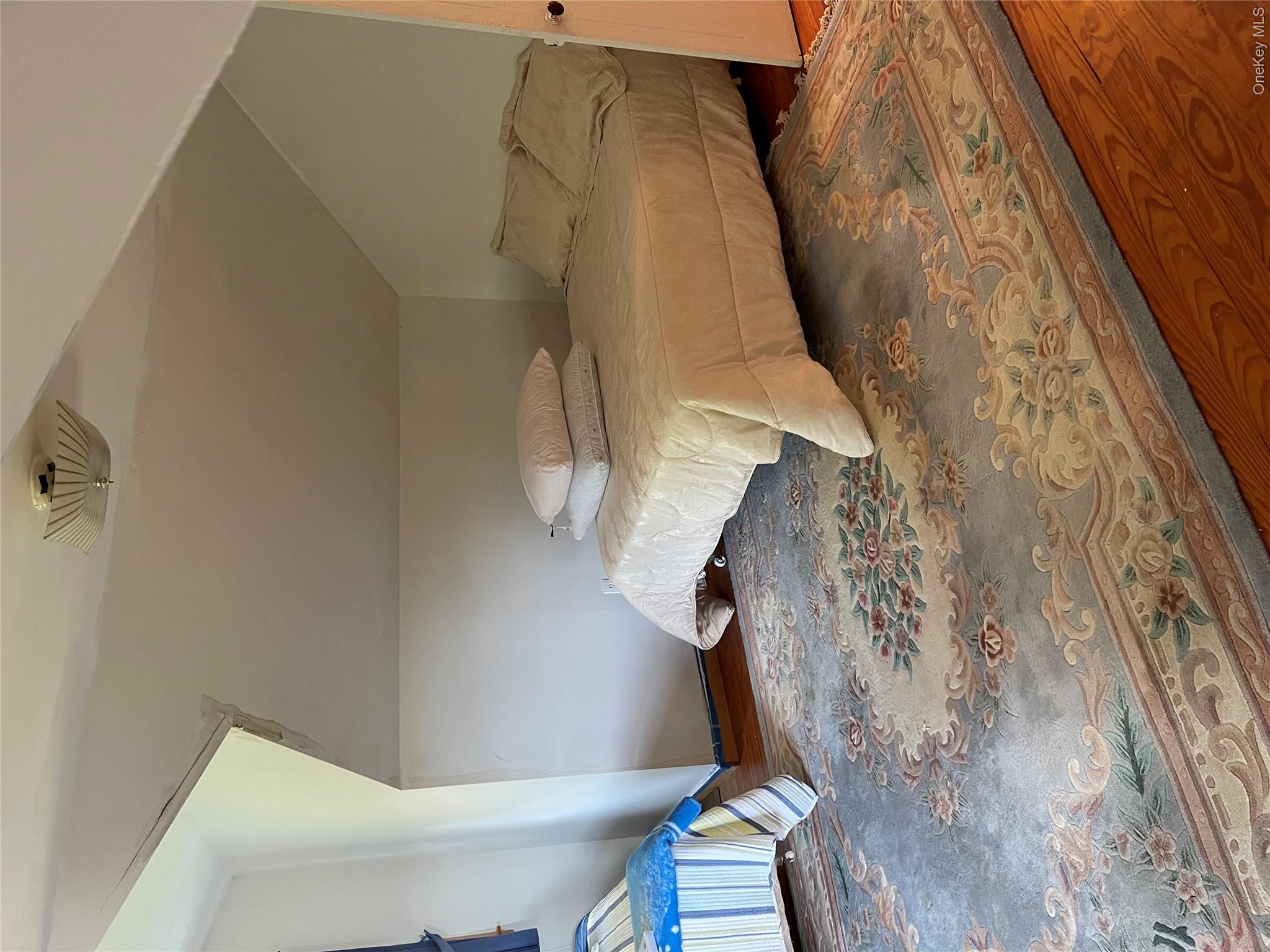 2614 Turnpike Road Delhi, NY 13753 - Photo 27 of 49 Charming bedroom retreat featuring sloped ceilings and abundant natural light
