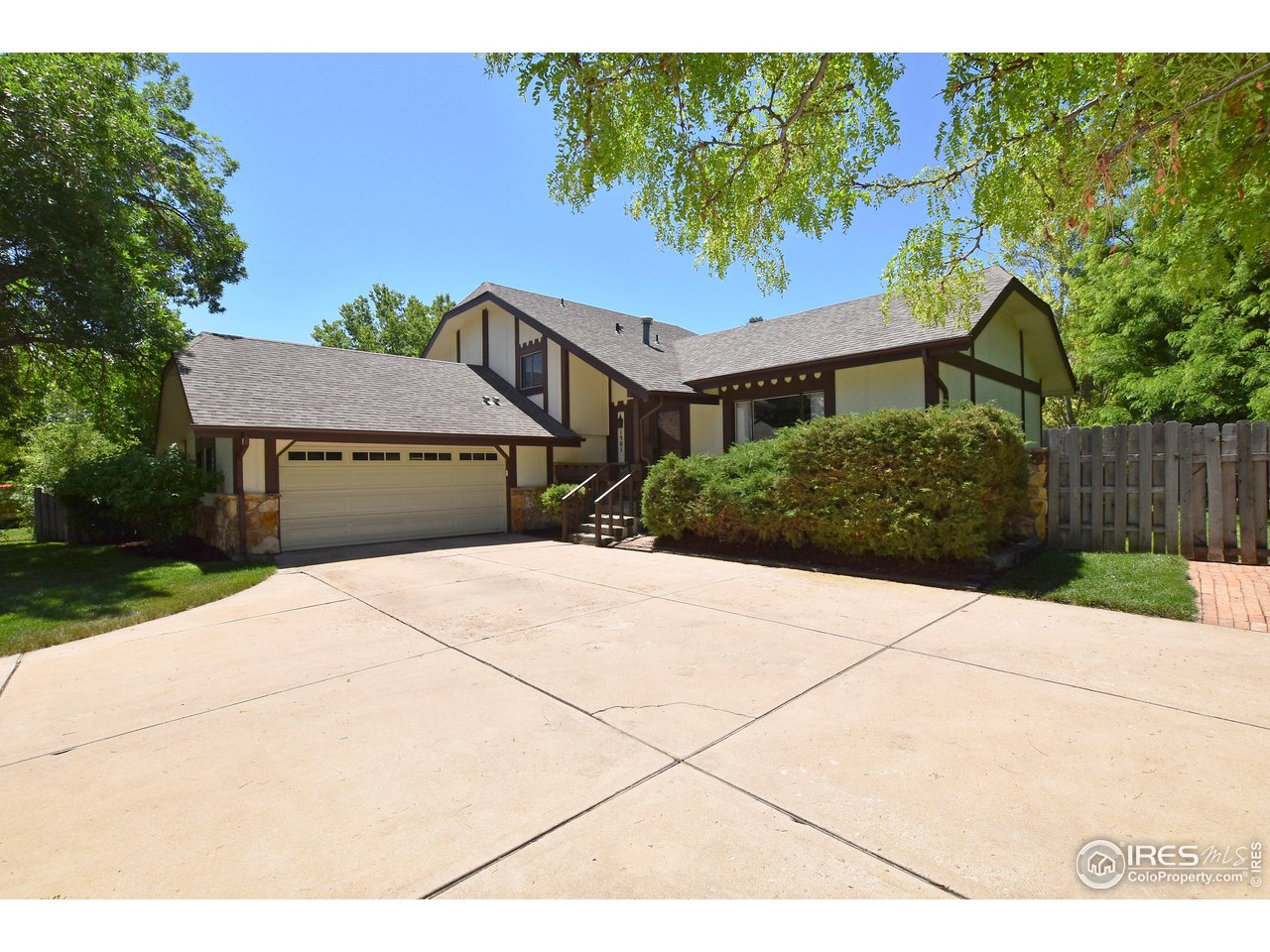 1501 Centennial Road Fort Collins, CO 80525 - Photo 1 of 40 Charming Tutor with side loan garage