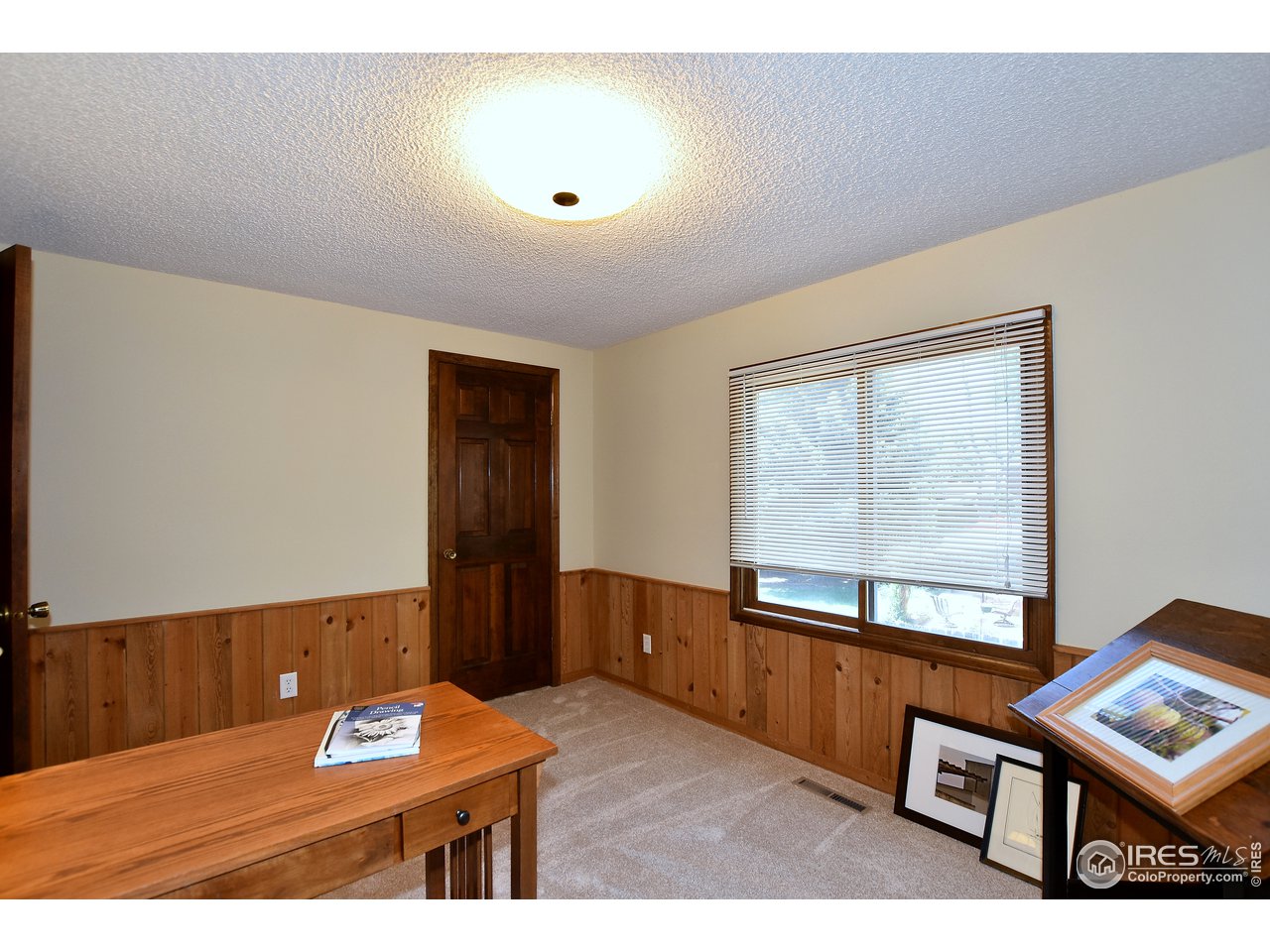 1501 Centennial Road Fort Collins, CO 80525 - Photo 20 of 40 Third Upstairs Bedroom with Wainscoting