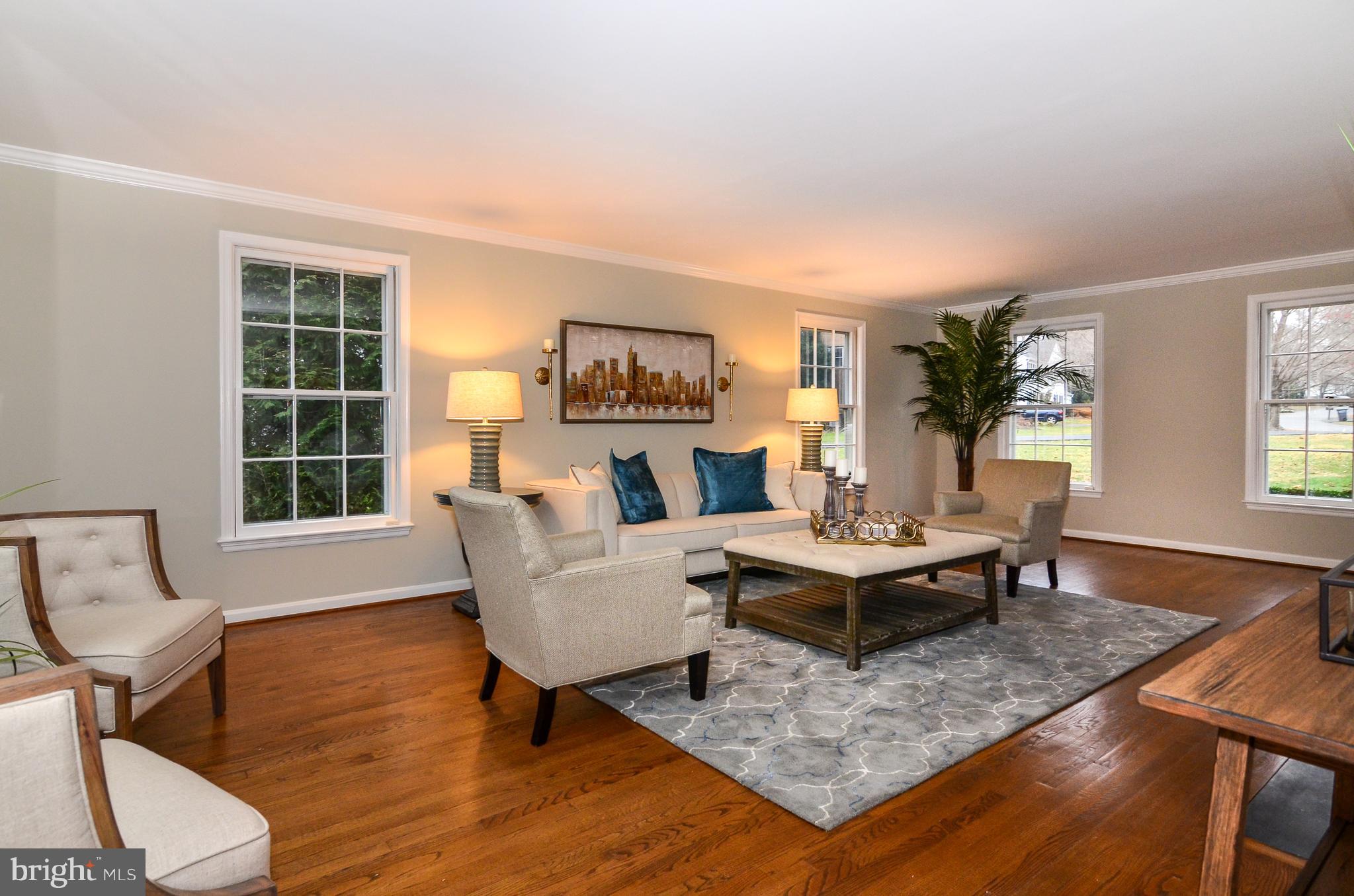 9712 Spring Ridge Lane Vienna, VA 22182 - Photo 12 of 46 Bright windows on three sides of living room