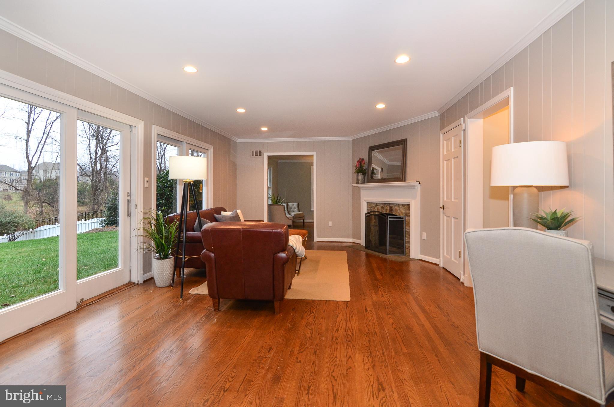 9712 Spring Ridge Lane Vienna, VA 22182 - Photo 14 of 46 Stone surround on Fireplace in Family Room