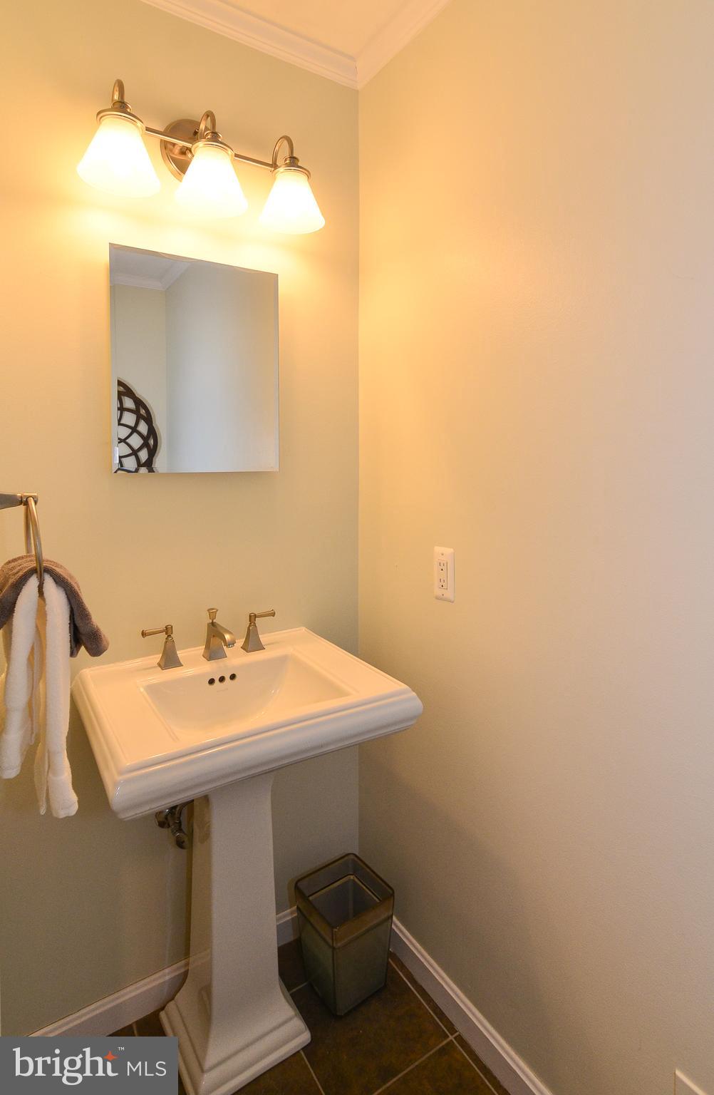 9712 Spring Ridge Lane Vienna, VA 22182 - Photo 17 of 46 powder room off kitchen and family room