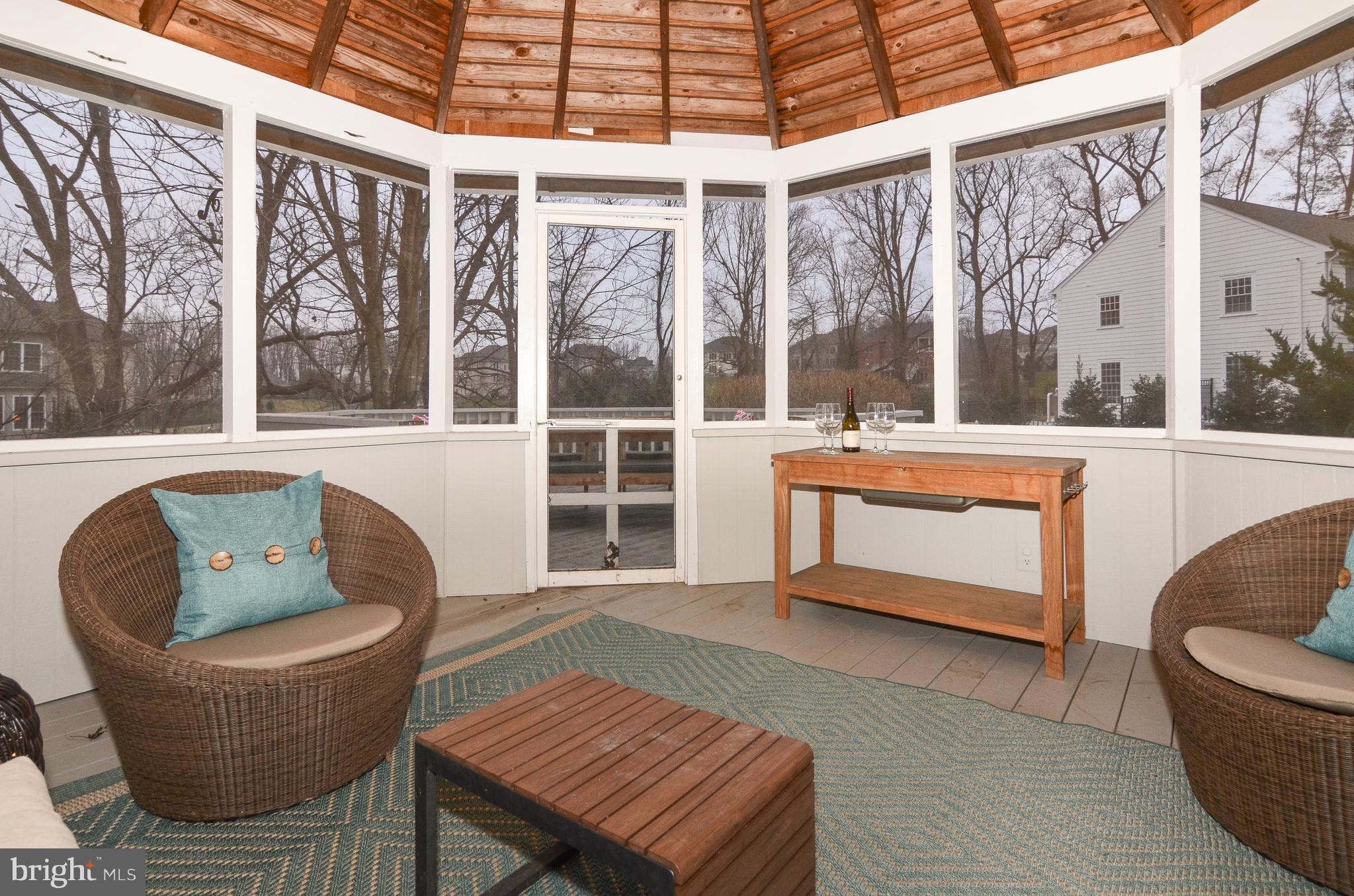 9712 Spring Ridge Lane Vienna, VA 22182 - Photo 25 of 46 Cozy screened in porch