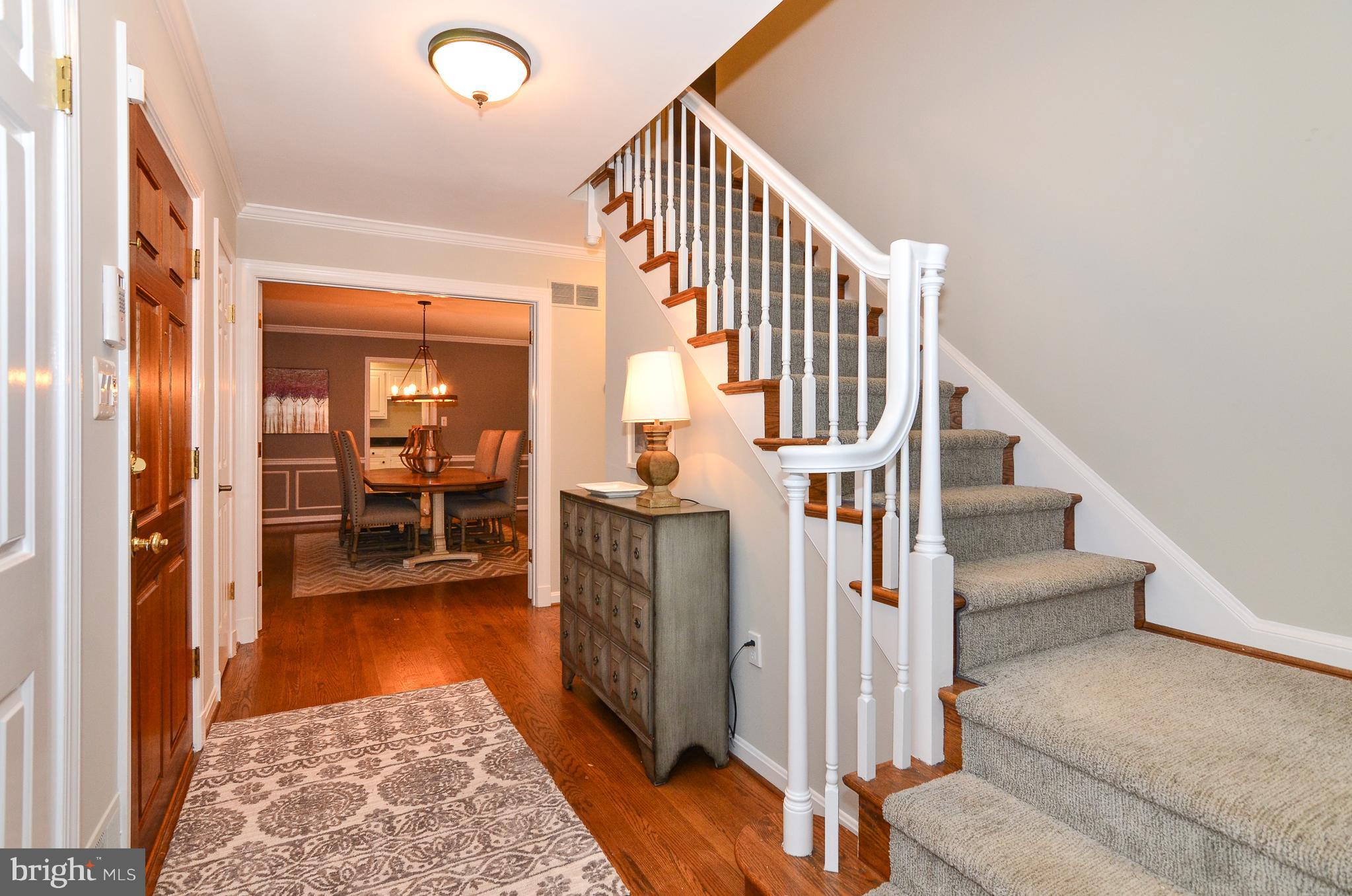 9712 Spring Ridge Lane Vienna, VA 22182 - Photo 6 of 46 Lovely foyer - hardwoods throughout home