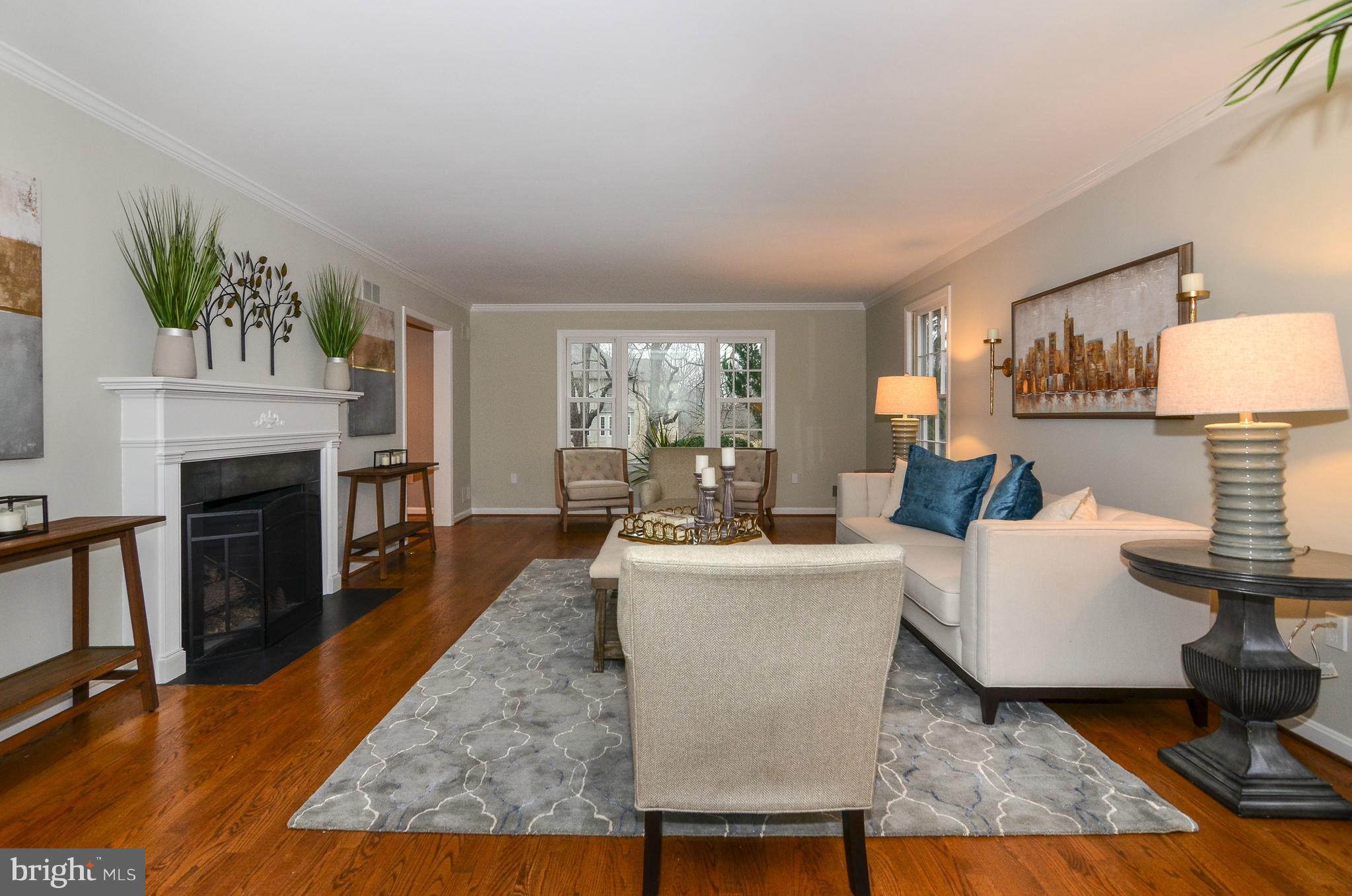 9712 Spring Ridge Lane Vienna, VA 22182 - Photo 10 of 46 Living room with beautiful fireplace